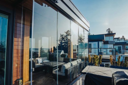 Lumon sliding glass walls on a beachfront patio