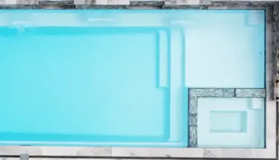 Santorini Sky pool color shown in a finished fiberglass swimming pool