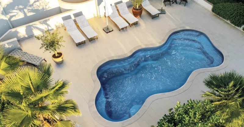 The Luma fiberglass pool design installed in a modern backyard