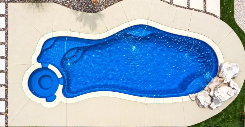 The Serene fiberglass pool design installed in a modern backyard
