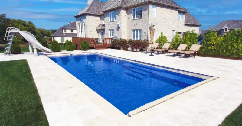 The Vita fiberglass pool design installed in a modern backyard